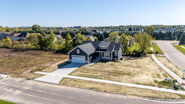 Property Photo:  1818 Northfield Court SW  MI 49315 