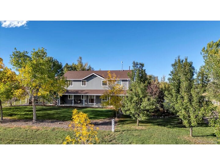 Property Photo:  10975 Maple Rd  CO 80026 