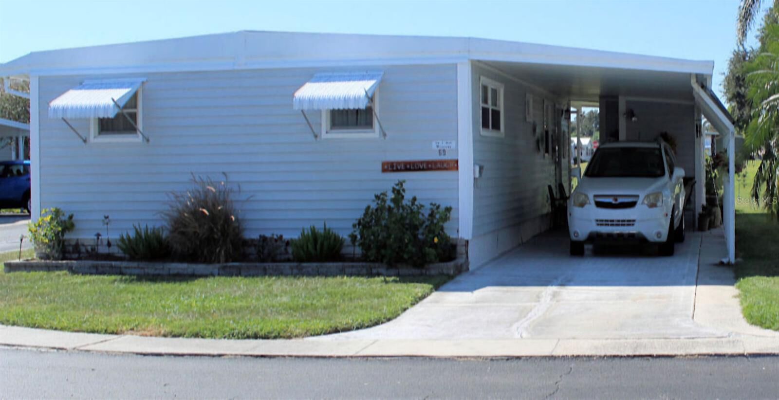 Property Photo:  69 Thatch Palm Street E  FL 33770