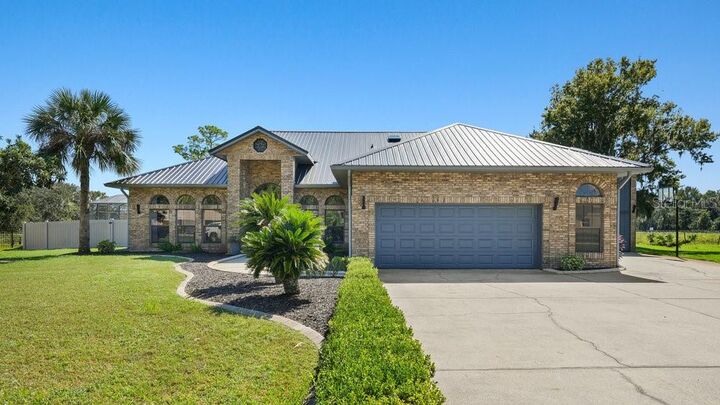 Photo de la propriété: 1948 Spruce Creek Landing FL 32128