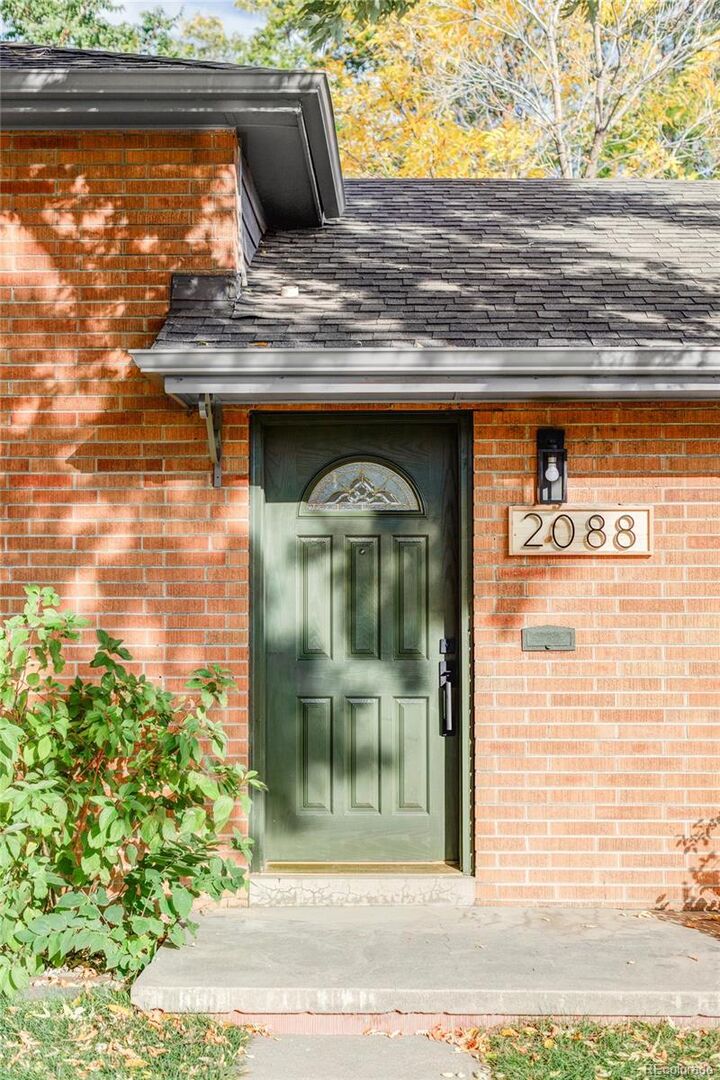 Property Photo:  2088 S Winona Court  CO 80219 