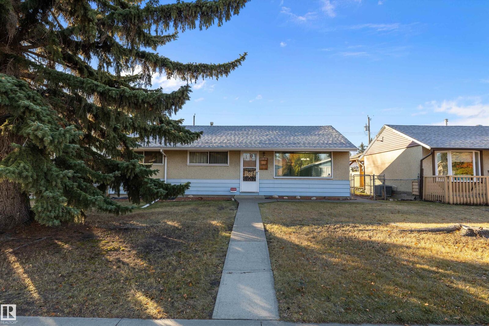 Property Photo:  13711 133 Avenue NW  AB T5L 3T3 