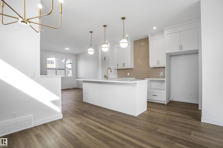 Property Photo: 9125 Elves Loop NW AB T6M 3G2