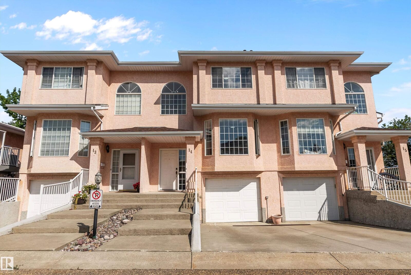 Property Photo: 11105 9 Avenue NW 14 AB T6J 6Z4