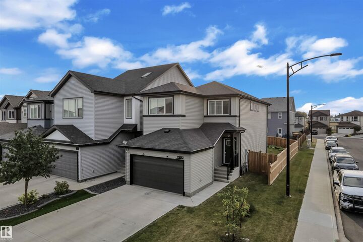 Property Photo:  9990 205A Street NW  AB T5T 7N4 