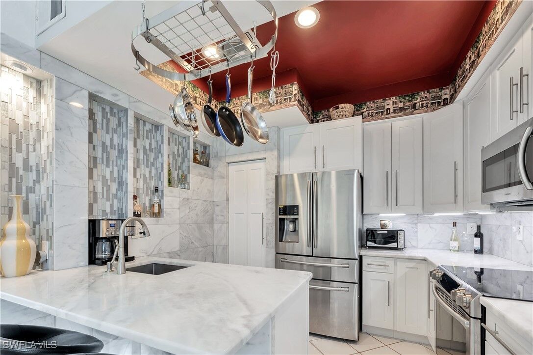 Property Photo: 15063 Sterling Oaks Drive FL 34110