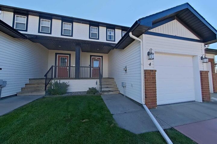 Property Photo: 295 Blackfoot Road W 4 AB T1K 8A6
