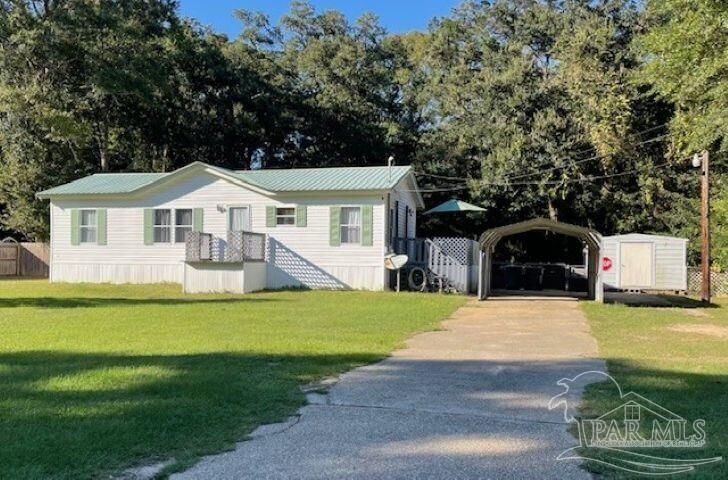 Property Photo: 8583 Cove Ave FL 32534