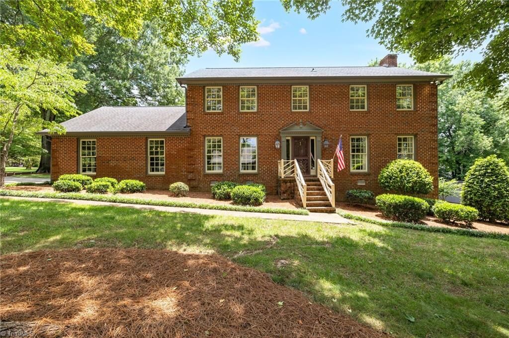 Property Photo:  6001 Muirfield Drive  NC 27410 