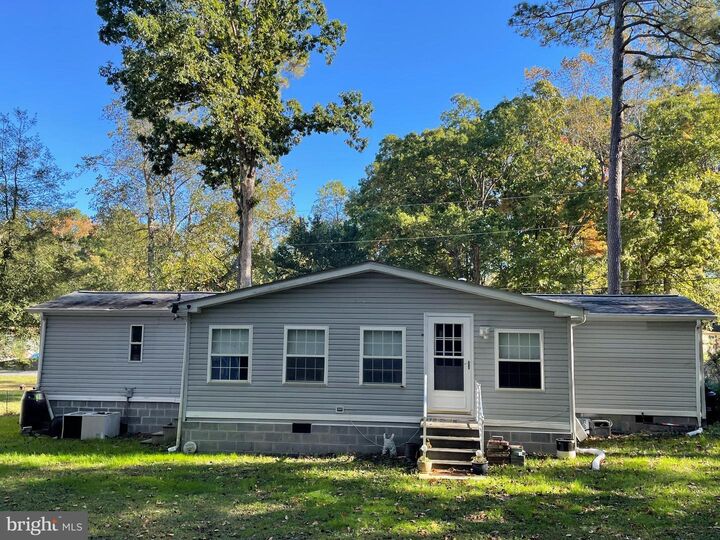 Property Photo: 22926 Cypress Drive DE 19958