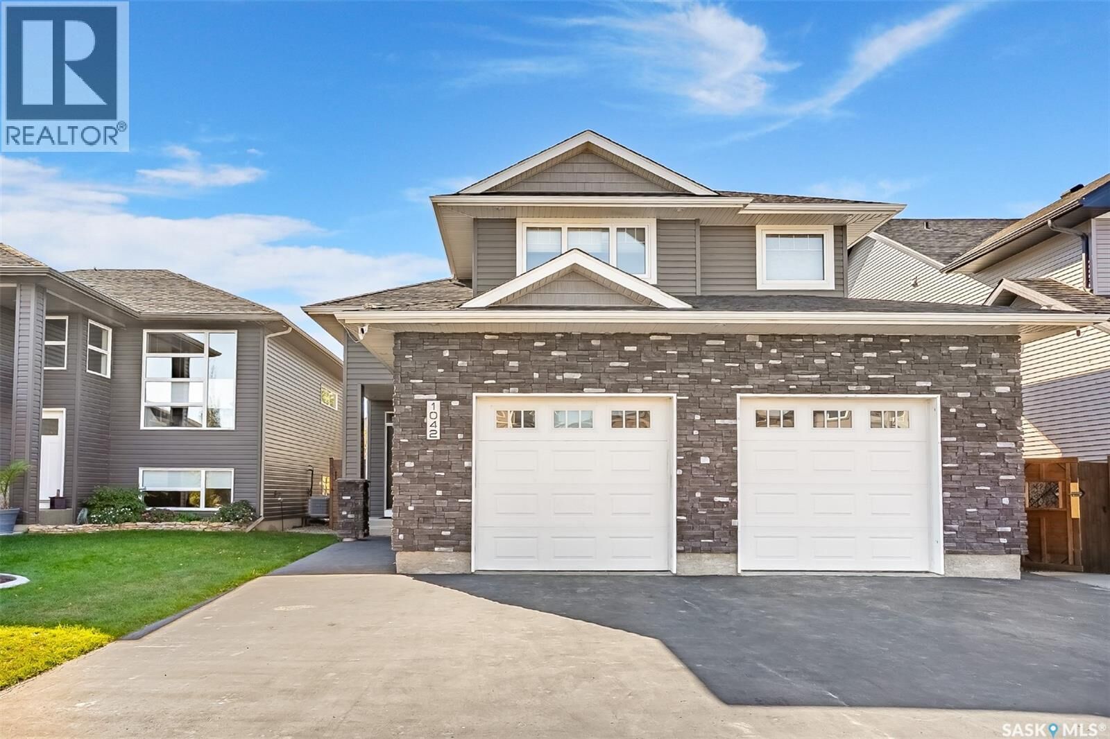 Property Photo: 1042 Glacial Shores Common SK S7W 0R3