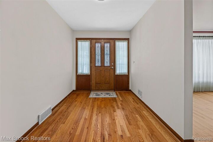 Property Photo:  23751 Gill Road  MI 48335 3515 