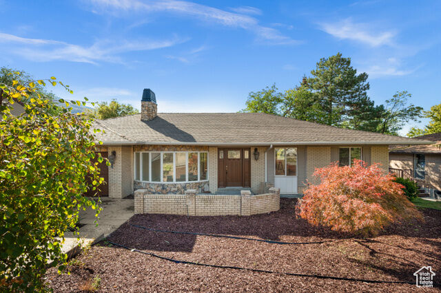 Property Photo: 3404 E Enchanted Hills Dr S UT 84121