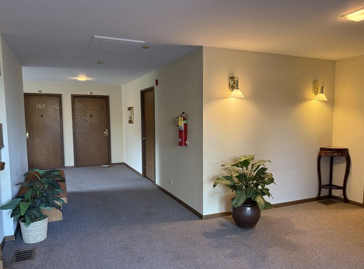 Property Photo: 7420 Grand Avenue 102B IL 60516