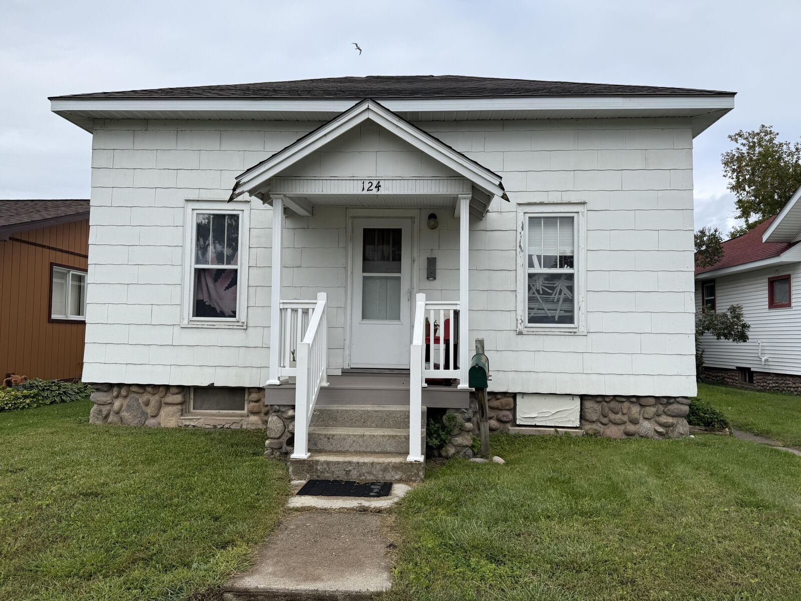 Property Photo:  124 S B Street  MI 49721 