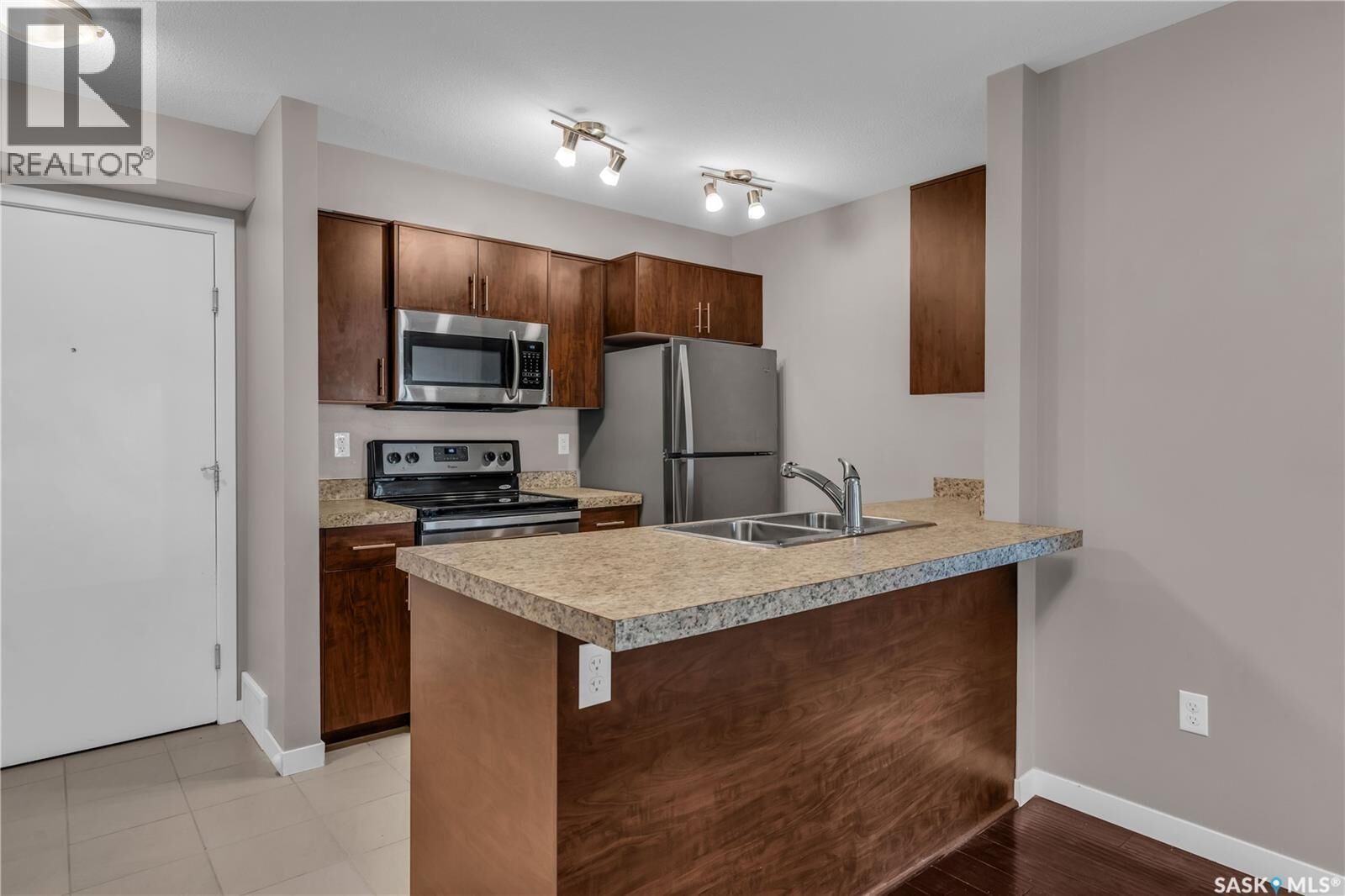 Property Photo:  1103 5500 Mitchinson Way  SK S4W 0N9