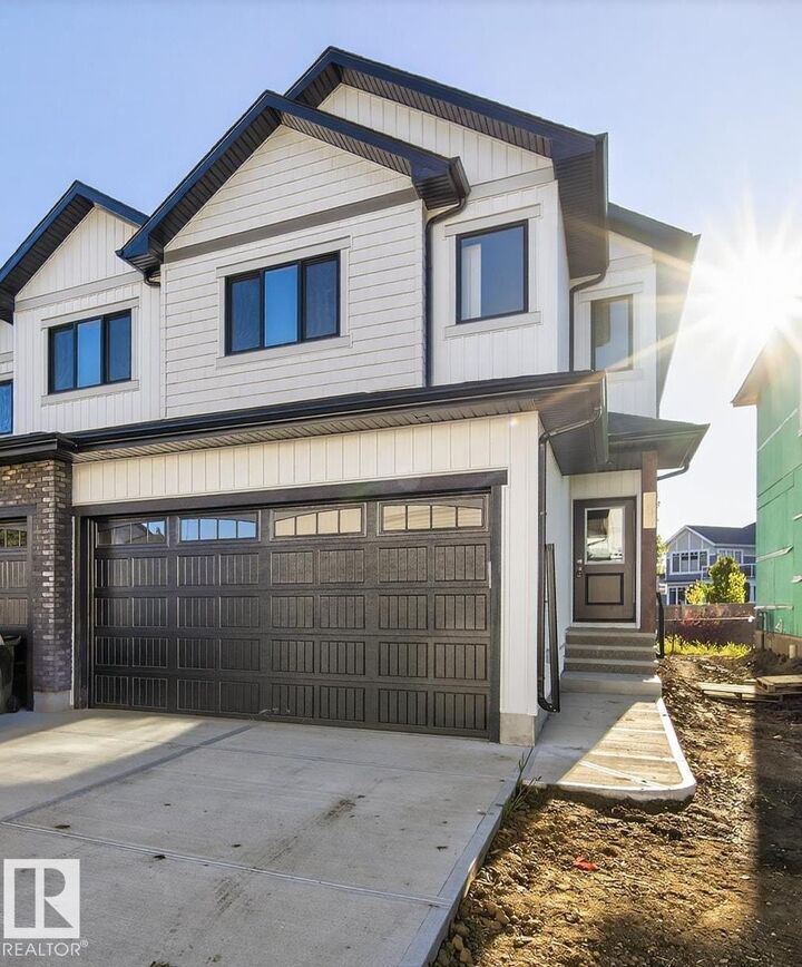 Property Photo: 5122 213A Street NW 5 AB T6M 0K7