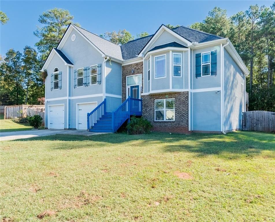 Property Photo:  404 Woodcreek  GA 30224