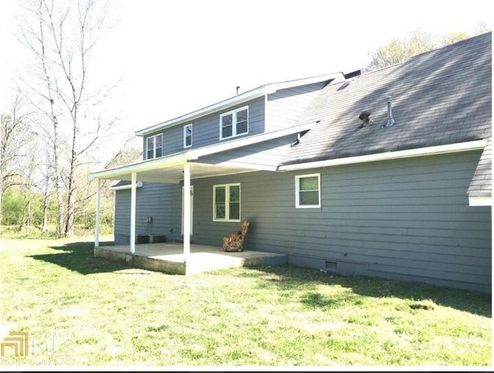 Property Photo: 6744 Rockbridge Road GA 30087