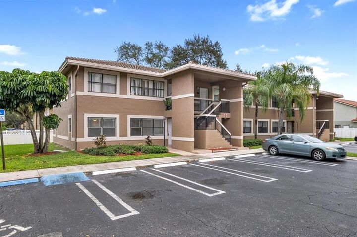 Property Photo:  11583 NW 42nd St 11583  FL 33065