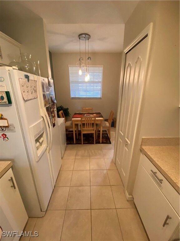 Property Photo: 6816 Sterling Greens Place 1105 FL 34104