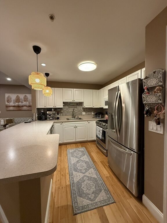 Property Photo:  614 Pond St 1415  MA 02184