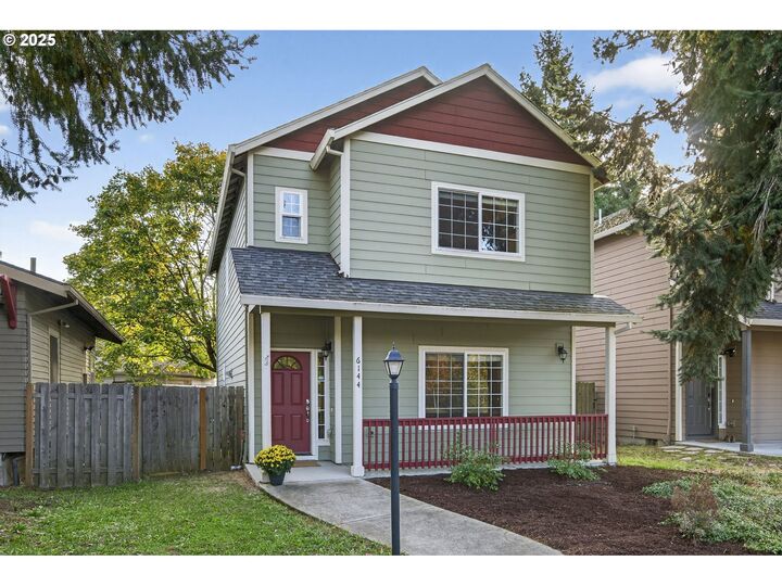 Property Photo:  6144 SE Duke St  OR 97206