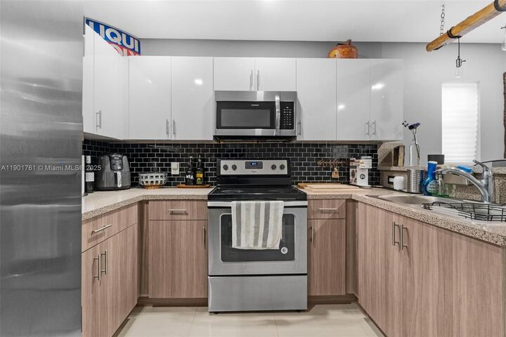 Property Photo:  1240 NW 38th St  FL 33142
