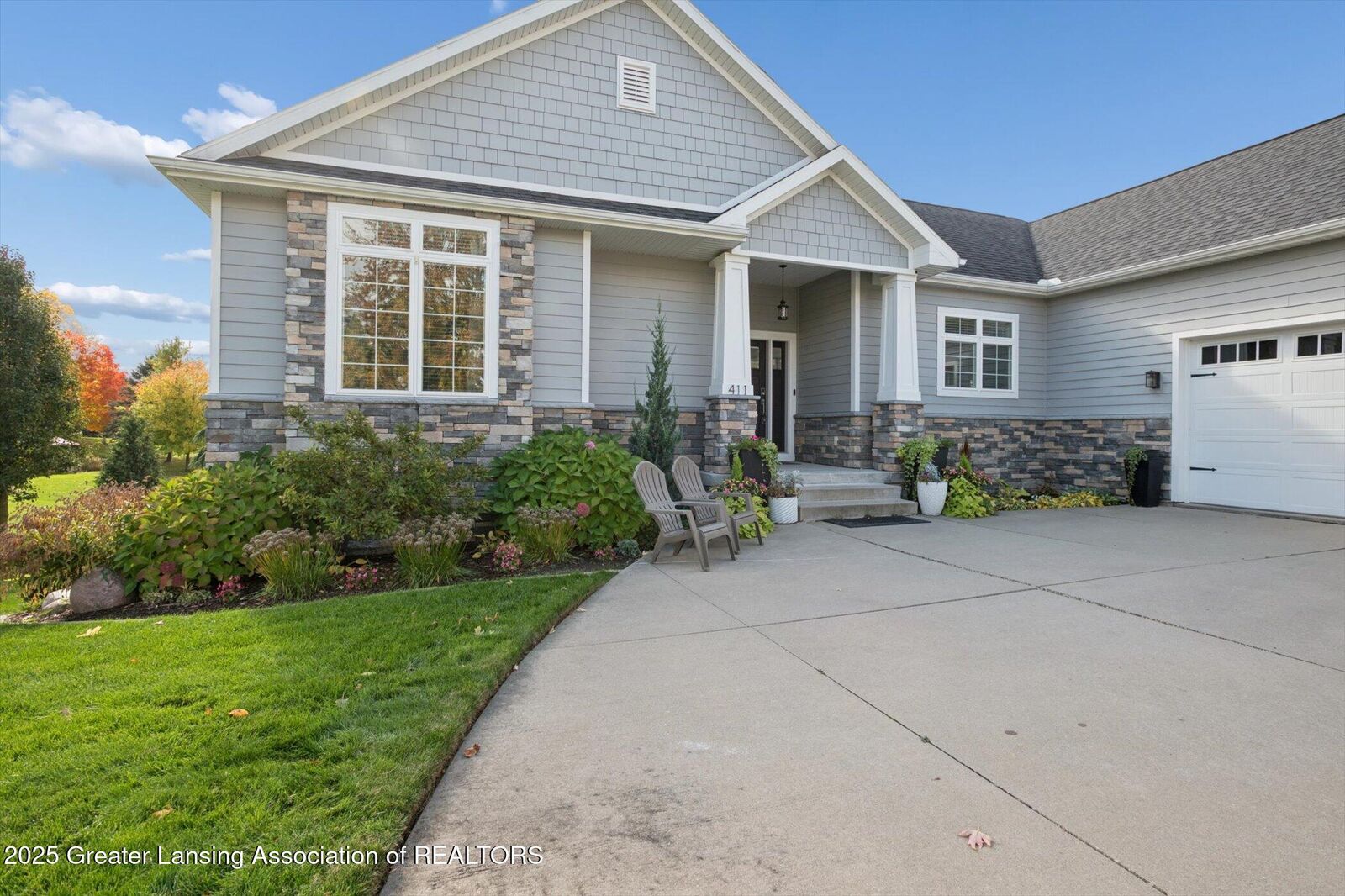 Property Photo:  411 Bubbling Spring Court  MI 48854