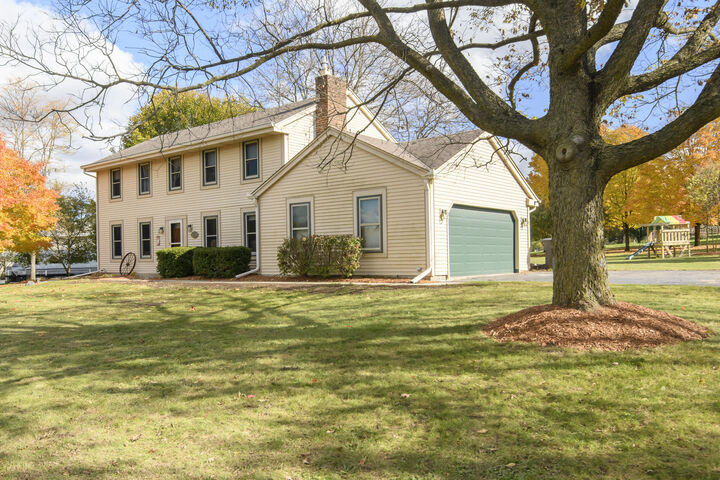 Property Photo:  W327s6938 Ashton Way  WI 53149