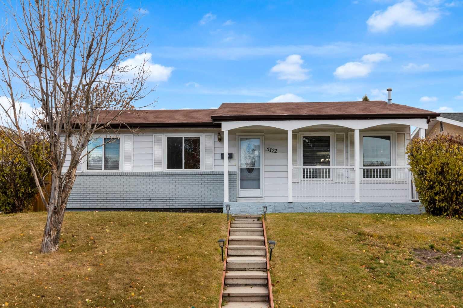 Property Photo:  5122 48 Street NW  AB T3A 0S9 