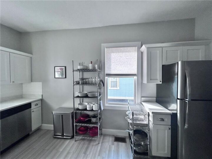 Property Photo:  141 Doyle Avenue 1  RI 02906