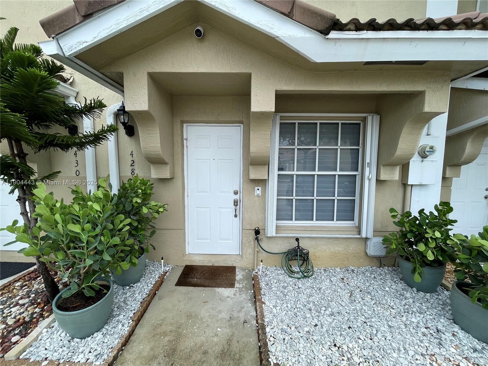 Property Photo: 428 SW 122nd Ave FL 33025