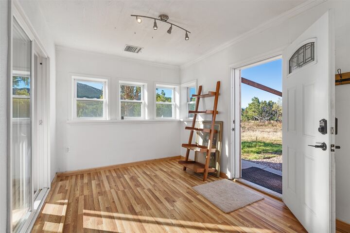 Property Photo: 166 Frontage Rd 2116 NM 87562