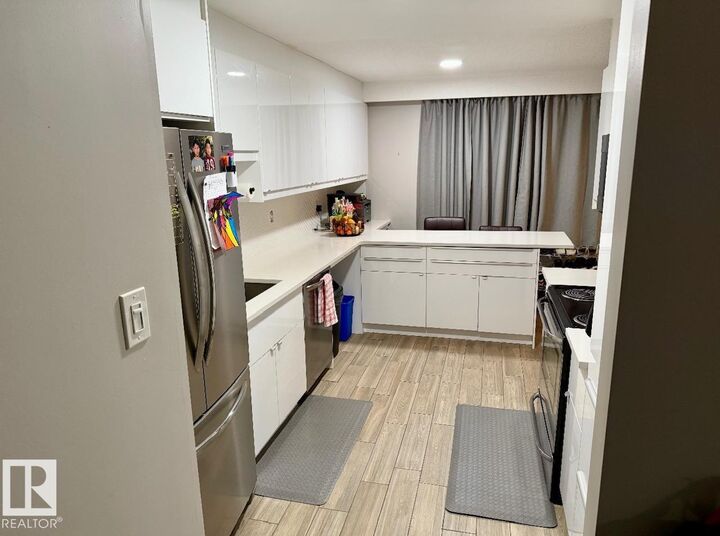 Property Photo:  7805 159 Street NW 108  AB T5R 2E1 