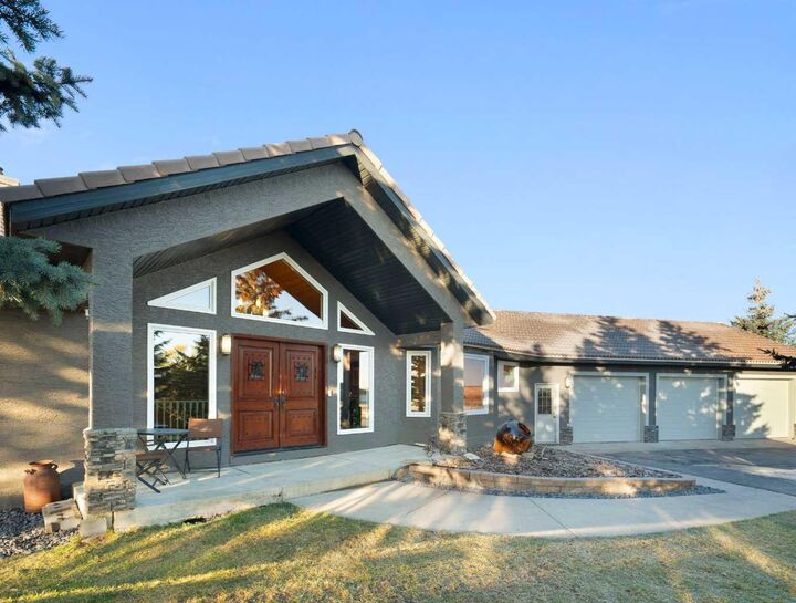 Property Photo: 33038 Township Road 272 AB T4C 2Z6