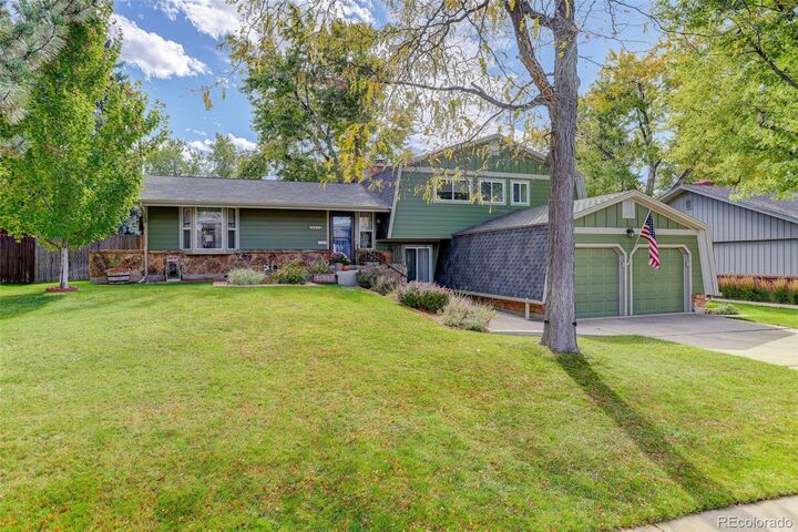 Property Photo: 9044 E Floyd Avenue CO 80231