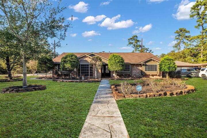 Property Photo:  603 Saint Andrews Road  TX 77339