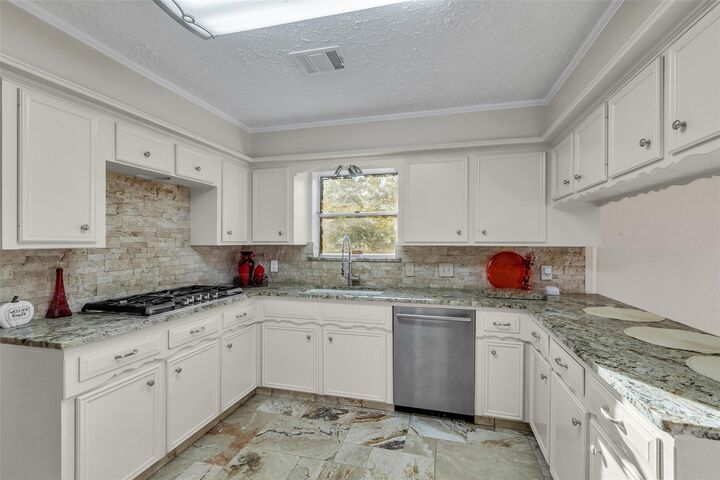 Property Photo:  603 Saint Andrews Road  TX 77339 