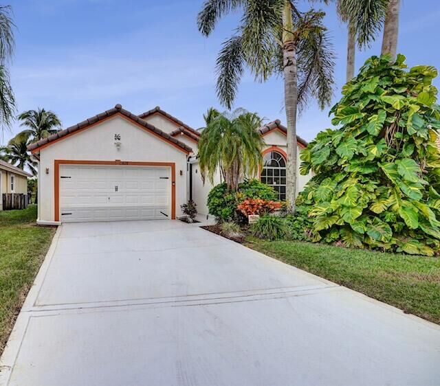 Property Photo: 1628 Carriage Brooke Drive FL 33414