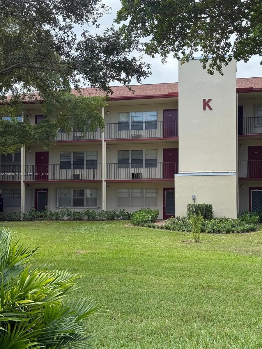 Property Photo:  100 SW 132nd Way 205K  FL 33027 