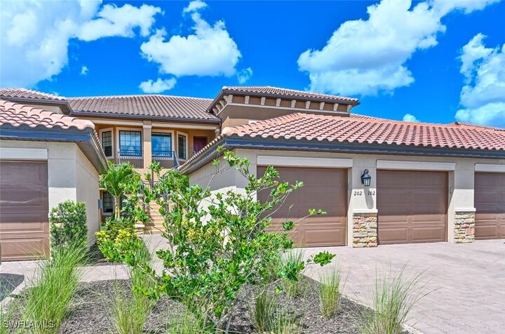 Property Photo: 9389 Pocida Court 202 FL 34119