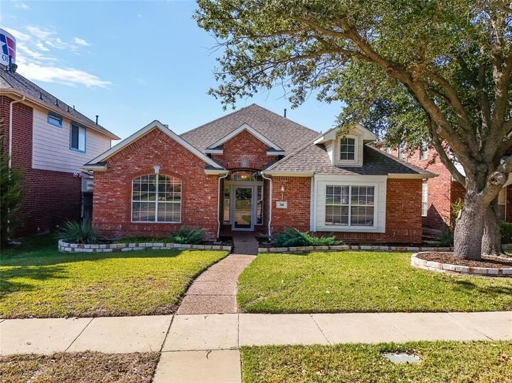 Property Photo: 310 Wrotham Lane TX 75013