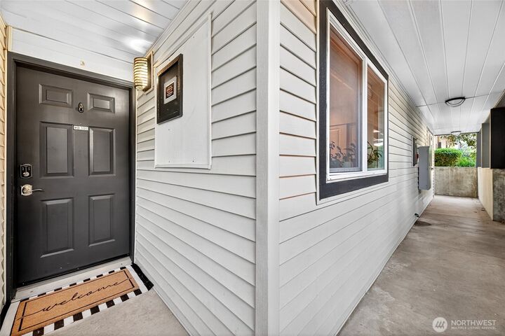 Property Photo:  8615  238th Street SW B101  WA 98026 