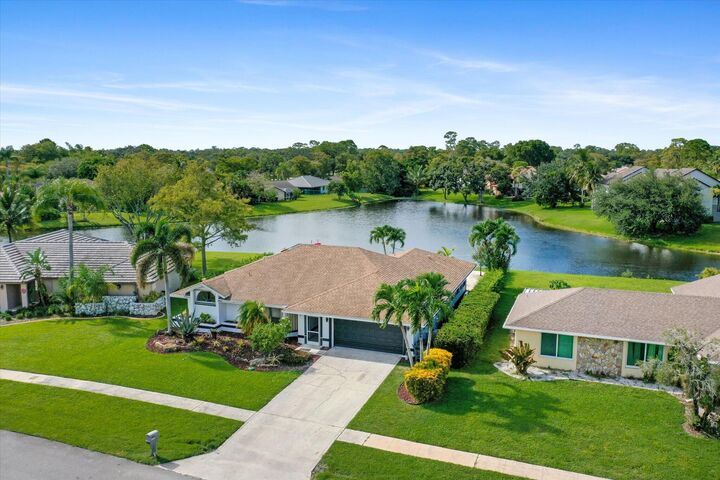 Property Photo: 13947 Geranium Place FL 33414