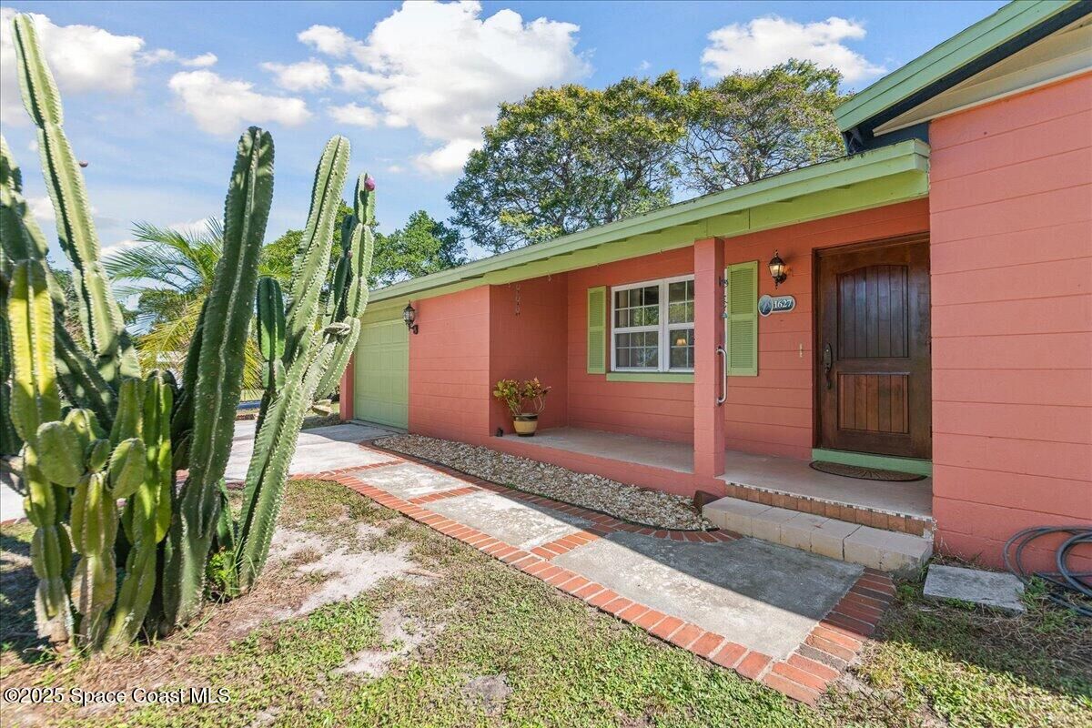 Property Photo: 1627 Calvados Drive FL 32926