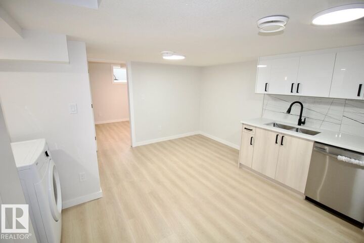Property Photo:  7107 46A Street Bsmt  AB T4X 3B8 