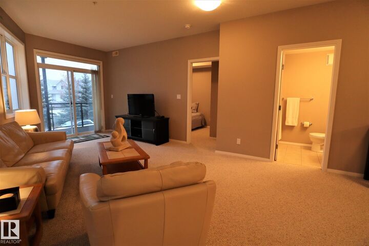 Property Photo:  9940 Sherridon Drive 200  AB T8L 4C9 