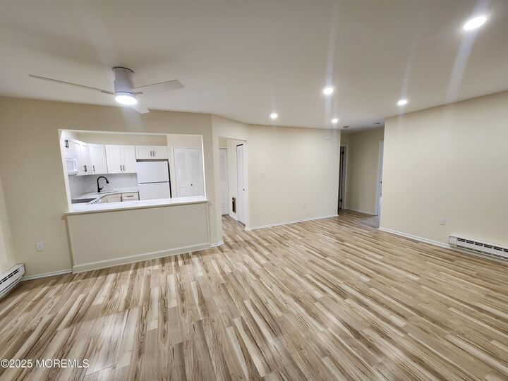 Property Photo:  129 Amberly Drive H  NJ 07726 