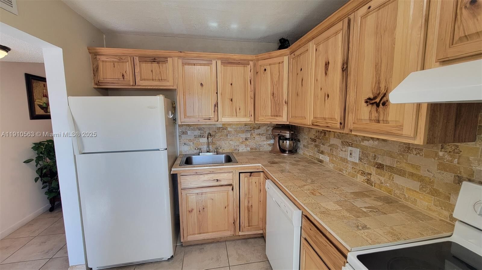 Property Photo:  5851 NW 62nd Ave 202  FL 33319 